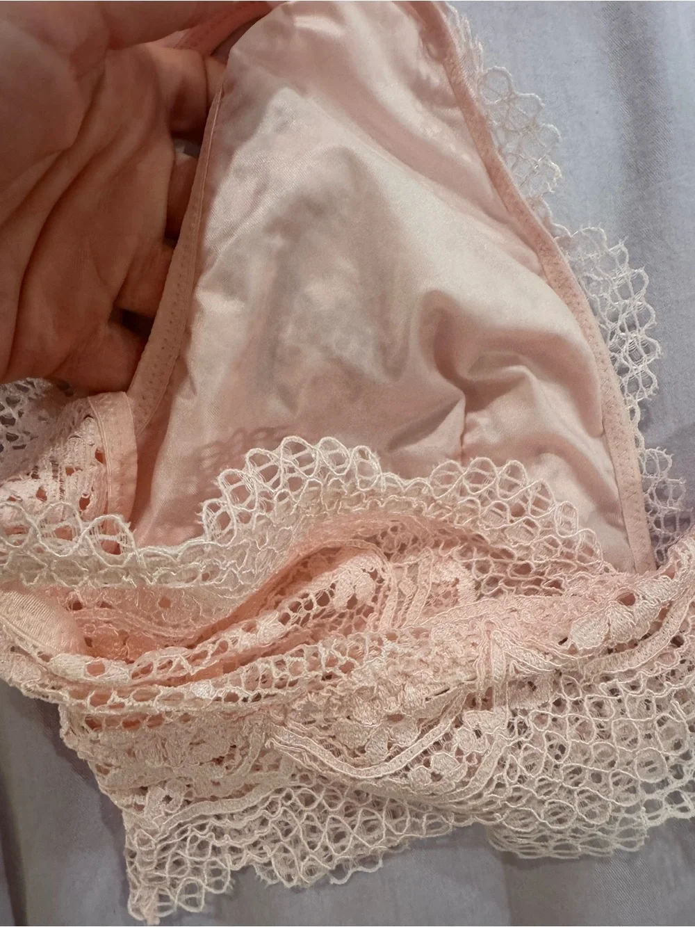 Victoria’s Secret pink lace bralette.